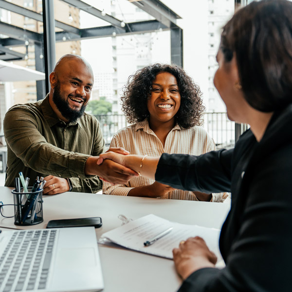 couple signing up for a loan
