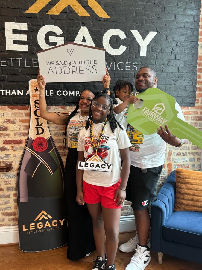 family celebrating mortgage closing
