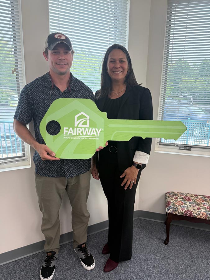 family celebrating mortgage closing