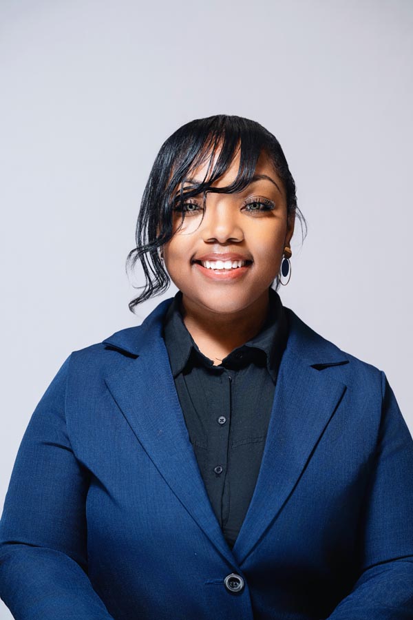 team member headshot from Headshot Happy Hour event