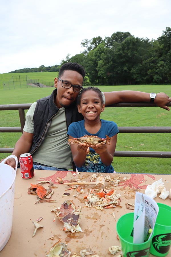 The Crane Team of Fairway enjoying a crab feast work event in 2025