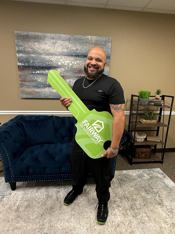 man celebrating mortgage closing