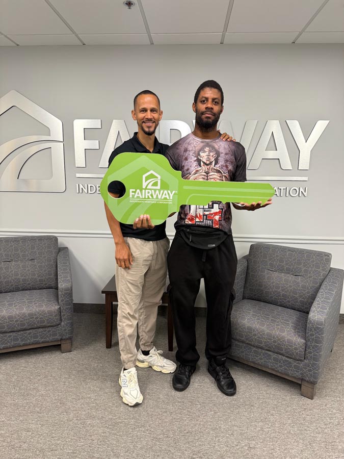man celebrating mortgage closing